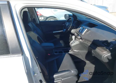 2015 Honda Cr-V Touring z USA, uszkodzony, nr VIN 5J6RM4H9XFL121982